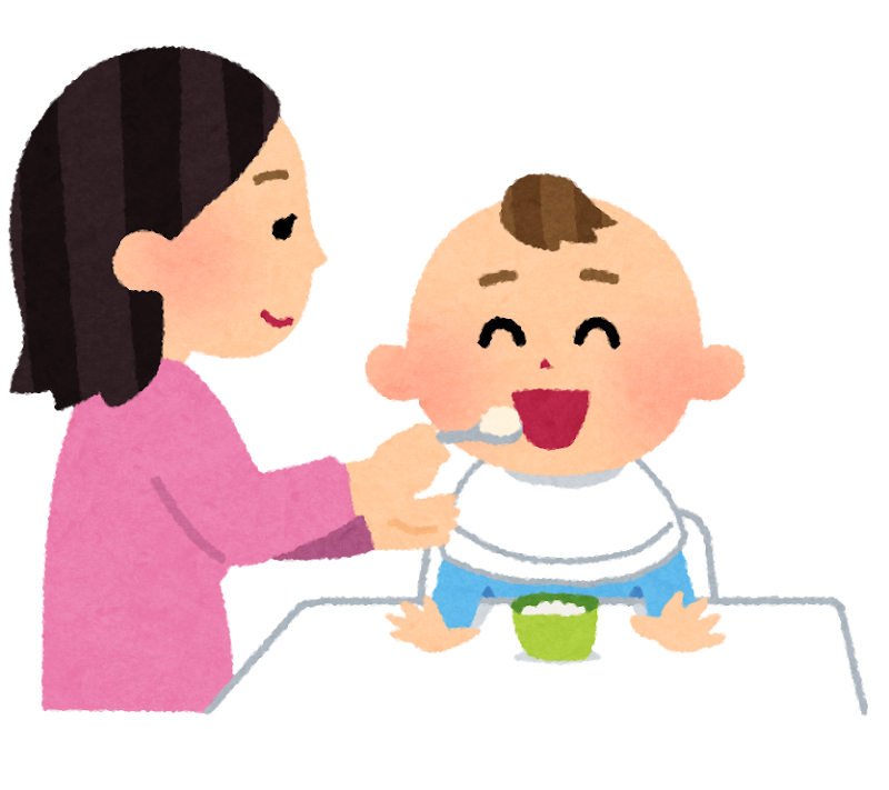 離乳食をあげる女性
